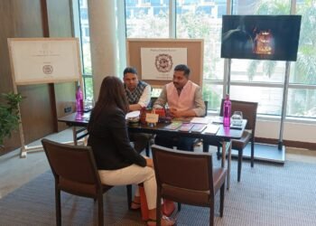 (Right) Mr Saurabh Pandey, Manager Events and Marketing for Madhya Pradesh Tourism Board along with (left) Mr Devendra Rai Resident Manager Delhi MO for Madhya Pradesh State Tourism Development Corporation interacting with the visitors at MP Tourism Stall.